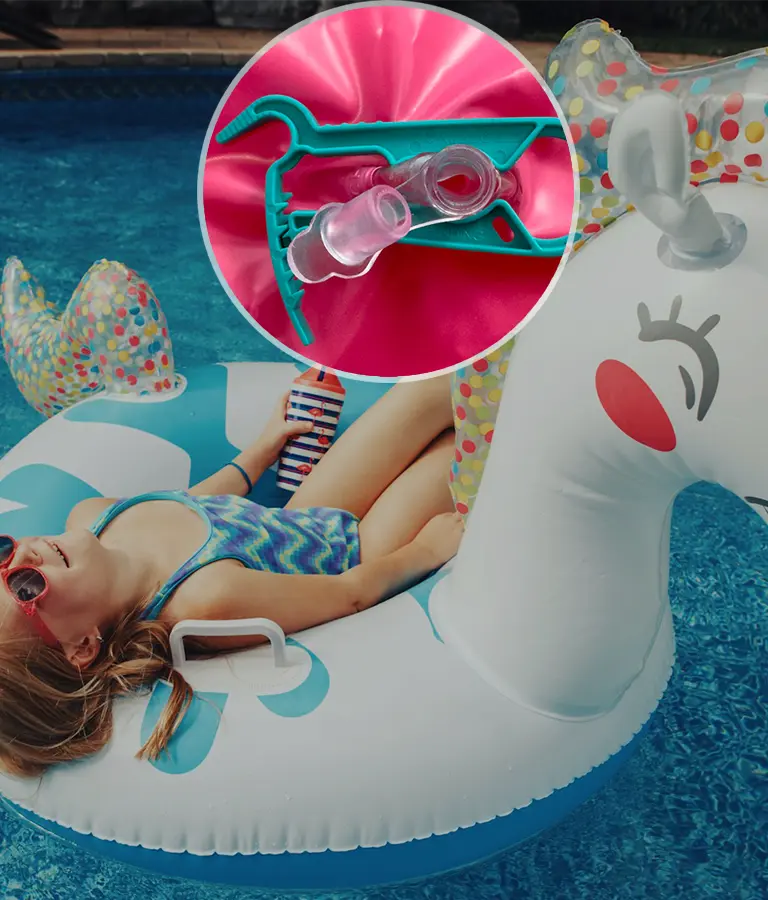 Child on a large inflatable unicorn float, made easy to inflate with EZBREEZY™ tool